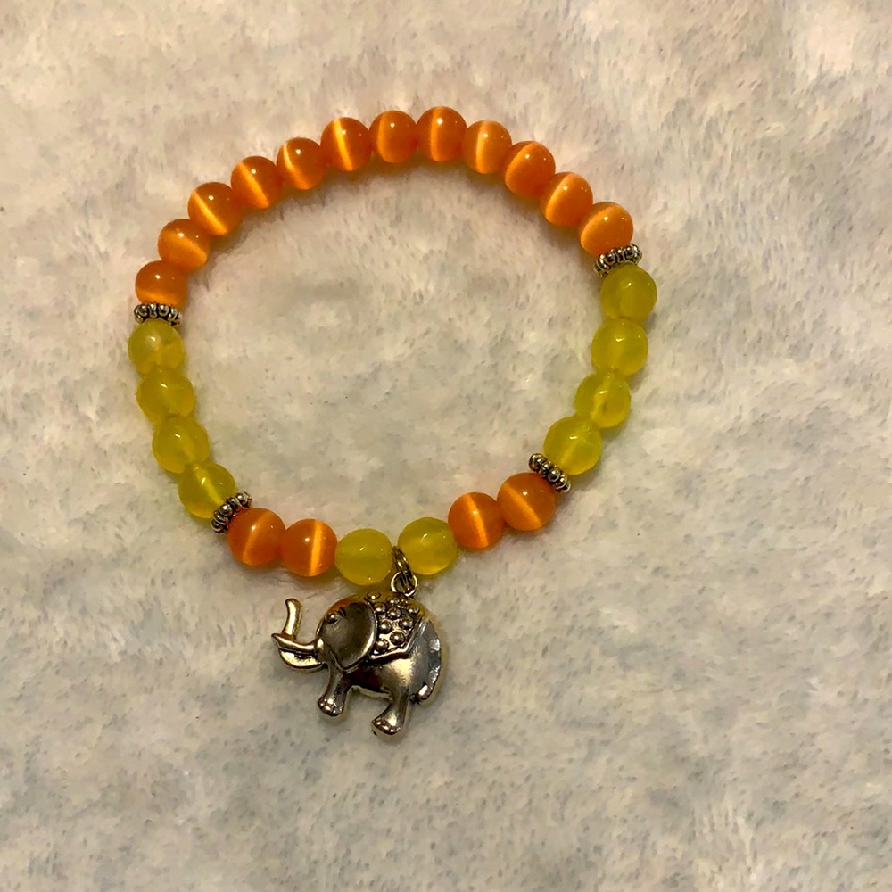 Come 1 come all beautiful handmade elephant with lovely bright colors